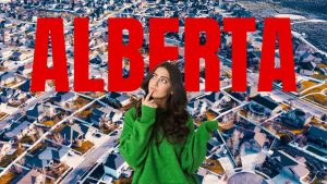 Pensive person stands before Alberta neighborhood view.